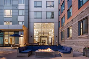 Cushy outdoor fireplace with seating